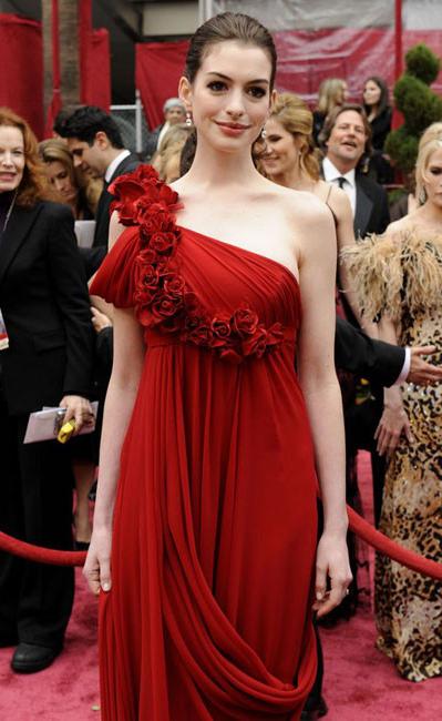 15P Sweet celebrity babe Anne Hathaway in nice see through dress