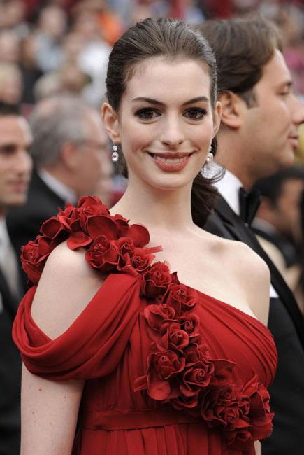 15P Sweet celebrity babe Anne Hathaway in nice see through dress