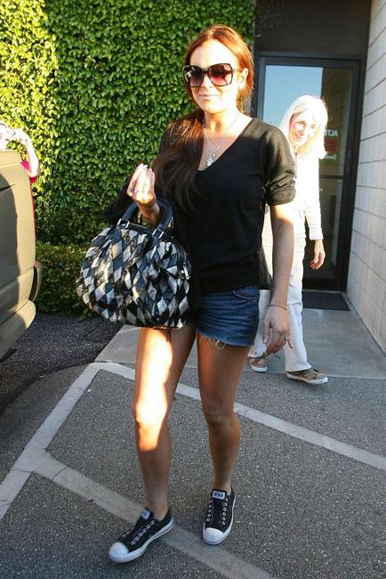 15P Cute celebrity Lindsay Lohan in nice jeans and some sexy upskirt