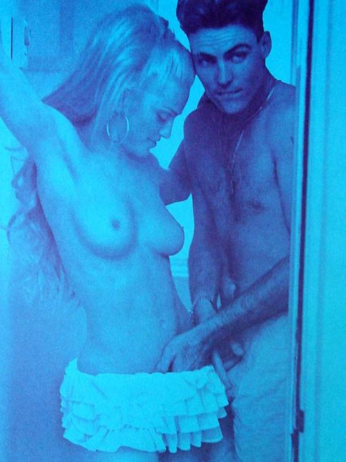 16P Madonna showing her nice big tits and hairy pussy
