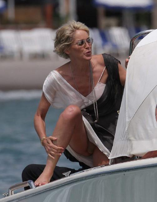 15P Celebrity babe Sharon Stone very hot upskirt and nude body