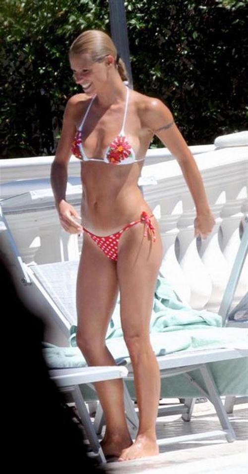 16P Michelle Hunziker showing her nice big tits and posing in thong