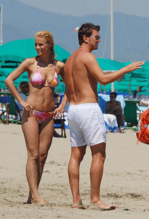 16P Michelle Hunziker showing her big tits on beach paparazzi pics