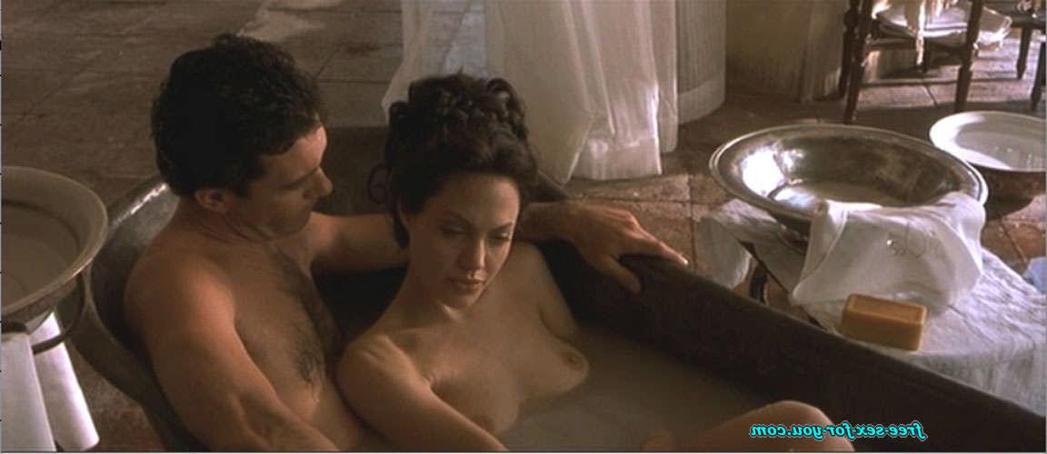 16P Angelina Jolie showing her nice big tits and fucking hard on bed