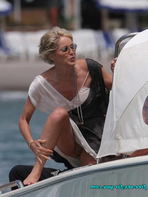 16P Sharon Stone showing her shaved pussy and big tits to paparazzi