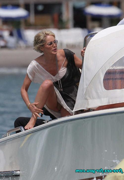 16P Sharon Stone showing her shaved pussy and big tits to paparazzi