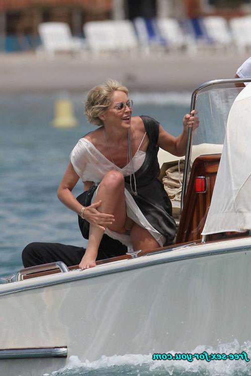 16P Sharon Stone showing her shaved pussy and big tits to paparazzi
