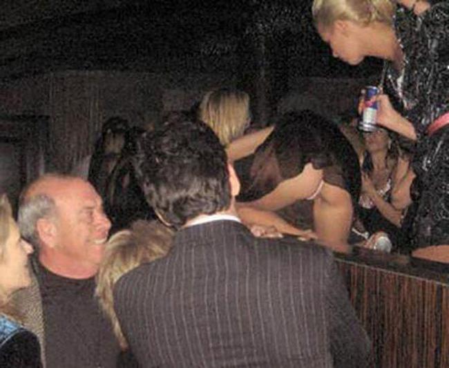 15P Celebrity Paris Hilton sexy upskirt and nasty nipple slip