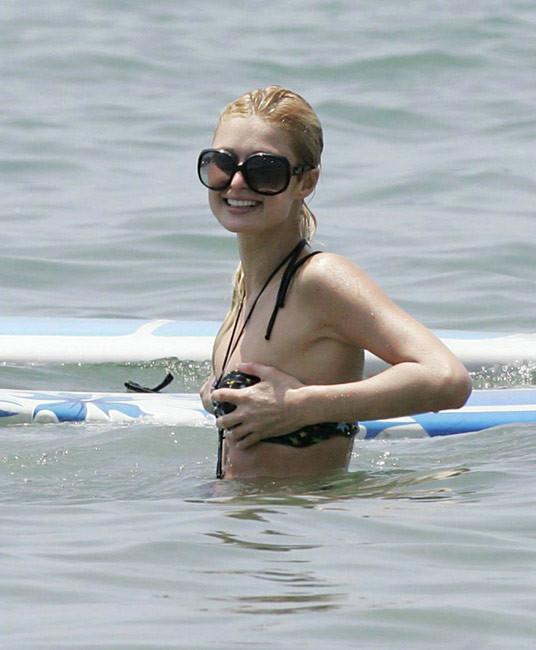 15P Celebrity Paris Hilton sexy upskirt and nasty nipple slip