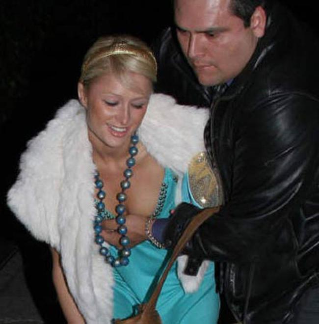 15P Celebrity Paris Hilton sexy upskirt and nasty nipple slip