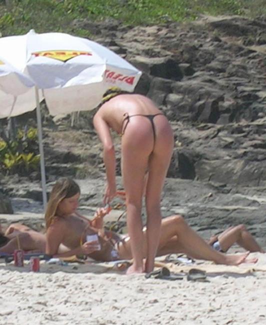 16P Celebrity Charlize Theron paparazzi nude boobs on the beach