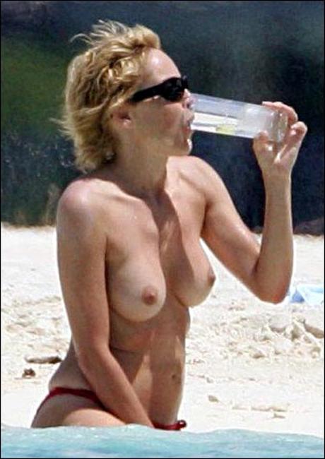 15P Sharon Stone smoking hot and sexy nude topless on the beach