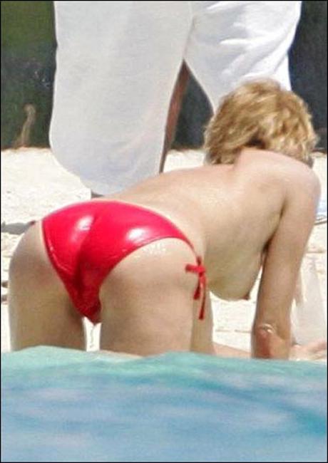 15P Sharon Stone smoking hot and sexy nude topless on the beach