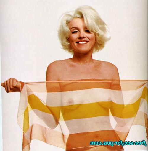 16P Marilyn Monroe showing her nice tits in see thru and posing nude