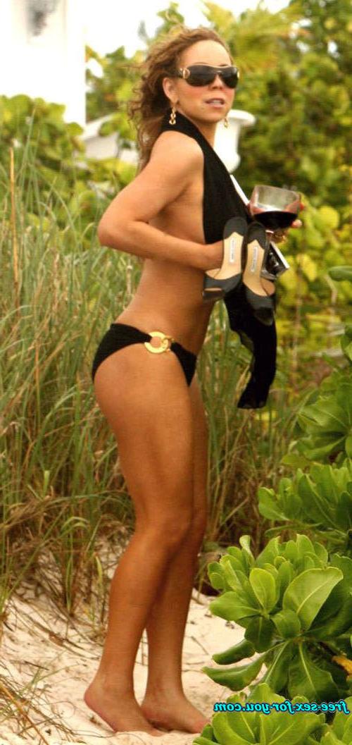 16P Mariah Carey tit slip and topless on beach paparazzi pictures