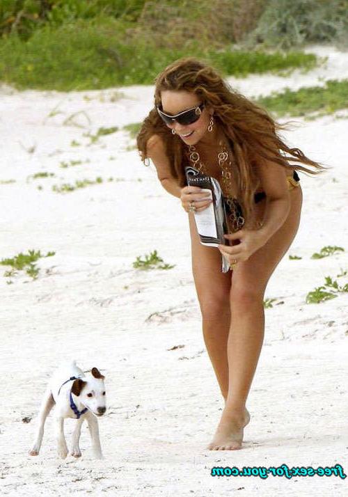 16P Mariah Carey tit slip and topless on beach paparazzi pictures