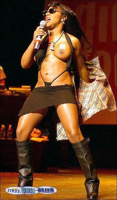 15P Celebrity Lil Kim fantastic nipple slip
