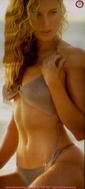 15P Lovely celebrity Rebecca Romijn showing her exotic tits