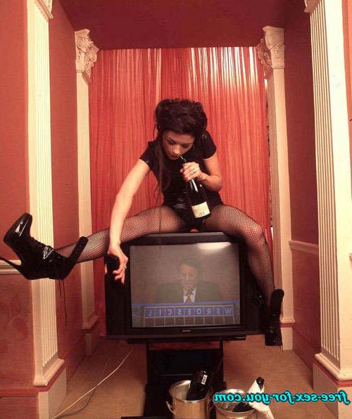 16P Catherine Zeta Jones in fishnets and posing sexy in mini skirt