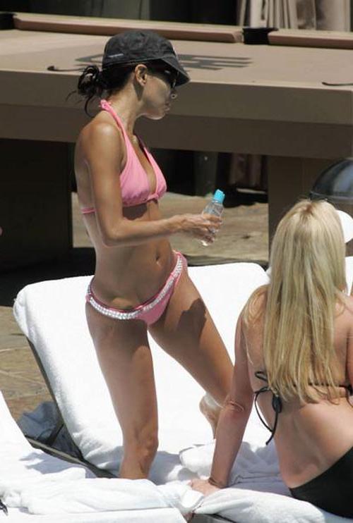16P Eva Longoria showing ass in bikini and posing in stockings