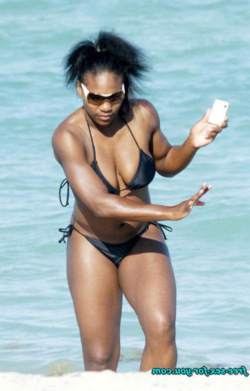 16P Serena Williams in black bikini on beach with her boyfriend