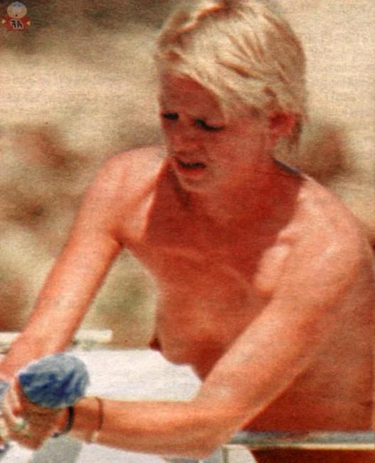 15P Good looking celebrity babe Zoe Ball nude on the beach