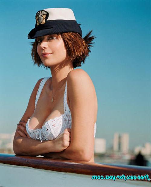 16P Catherine Bell posing in bikini and see thru dress