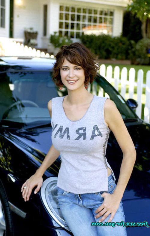 16P Catherine Bell posing in bikini and see thru dress