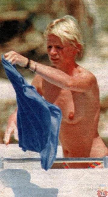 16P Celebrity hot blonde Zoe Ball shows nude tits on the beach