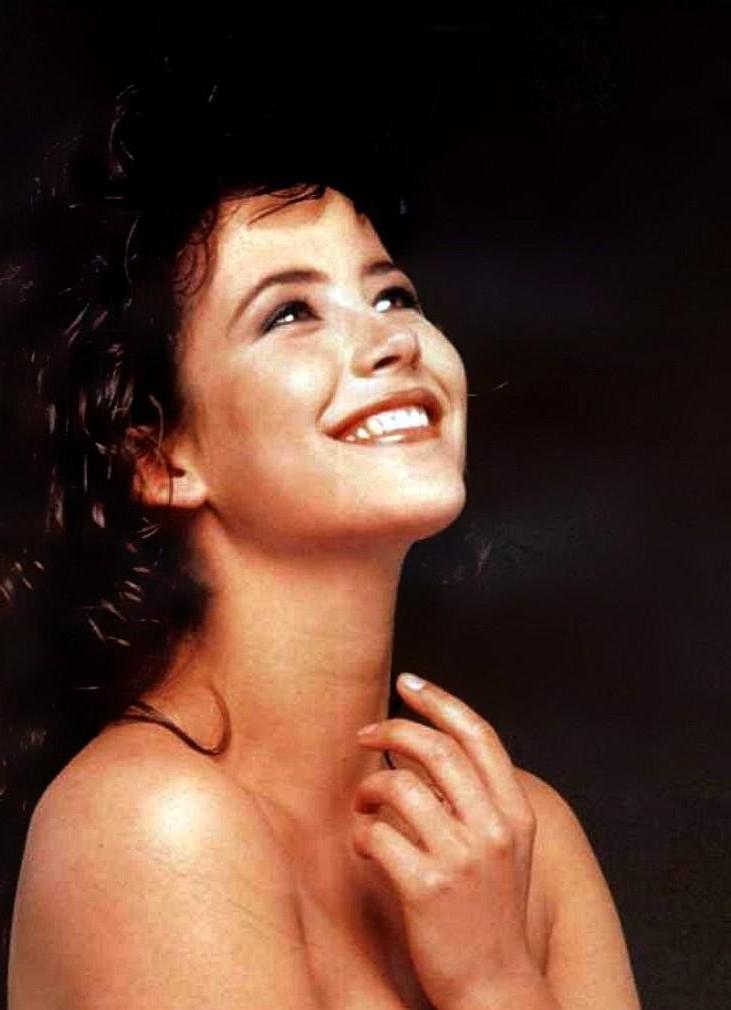 16P Sophie Marceau nude on bed and tit slip paparazzi pictures