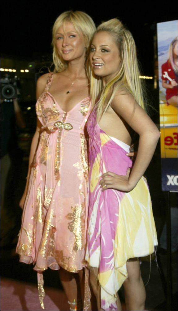 16P Paris Hilton nipple slip and bikini beach paparazzi pictures