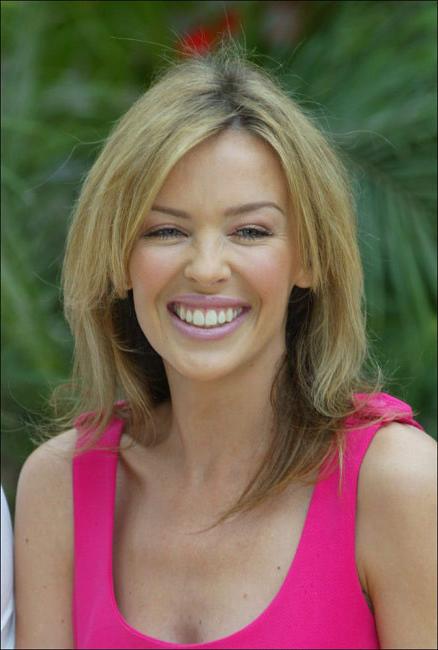 16P Exotic celebrity Kylie Minogue showing her hard nipples