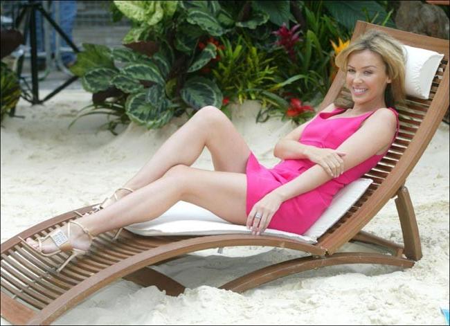 16P Exotic celebrity Kylie Minogue showing her hard nipples