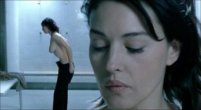 16P Cute italian actress Monica Bellucci showing perky tits