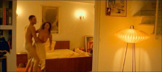 16P Cute italian actress Monica Bellucci showing perky tits