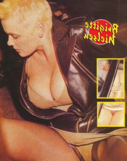 16P Brigitte Nielsen topless paparazzi pictures and flashing pussy