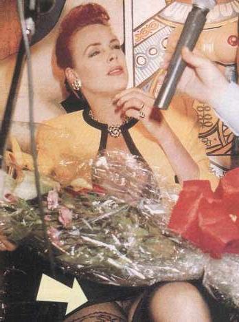 16P Brigitte Nielsen topless paparazzi pictures and flashing pussy
