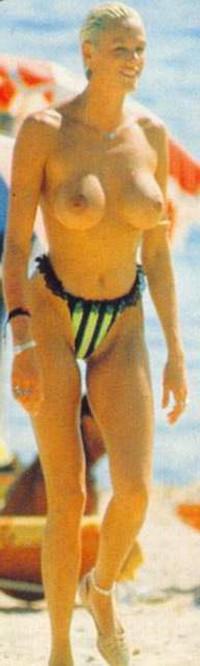 16P Brigitte Nielsen topless paparazzi pictures and flashing pussy