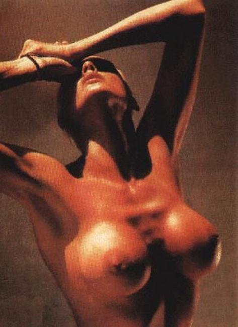 15P Brigitte Nielsen showing her huge boobs