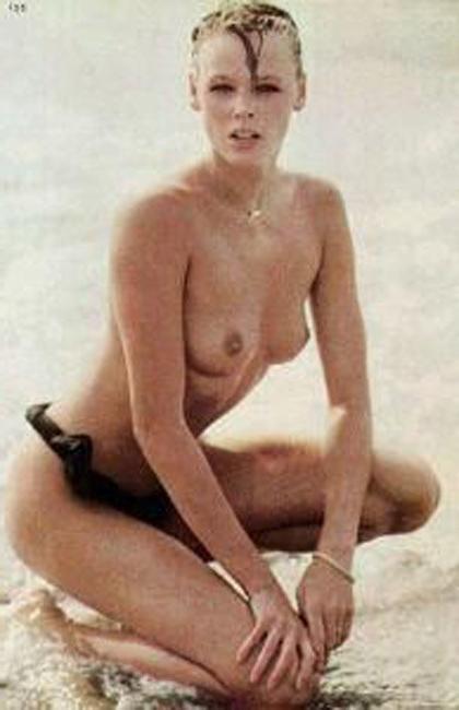 15P Brigitte Nielsen showing her huge boobs