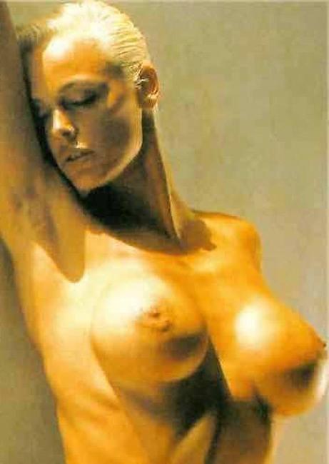 15P Brigitte Nielsen showing her huge boobs