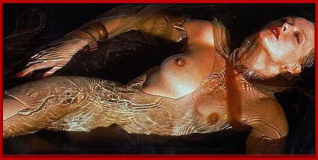 15P Brigitte Nielsen showing her huge boobs