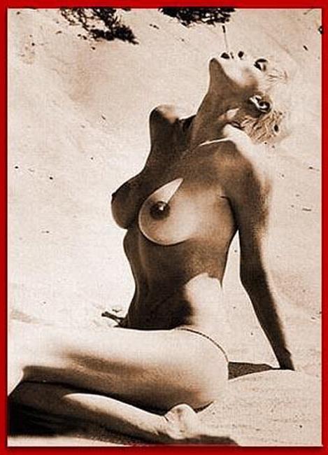 15P Brigitte Nielsen showing her huge boobs