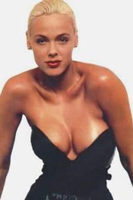 15P Brigitte Nielsen showing her huge boobs