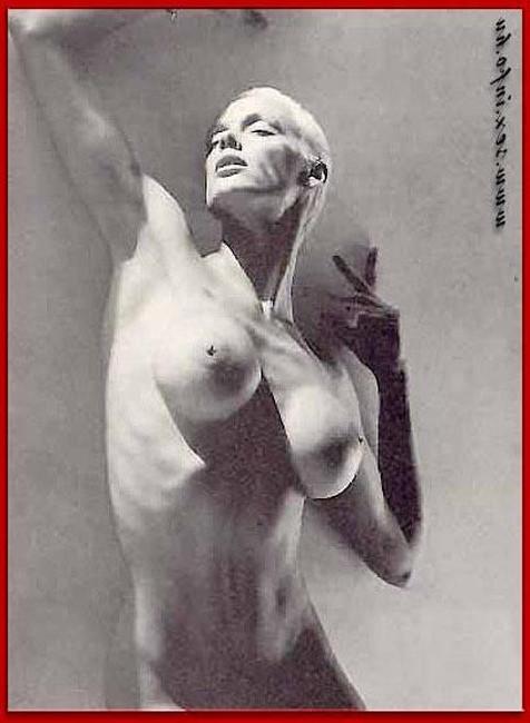 15P Brigitte Nielsen showing her huge boobs