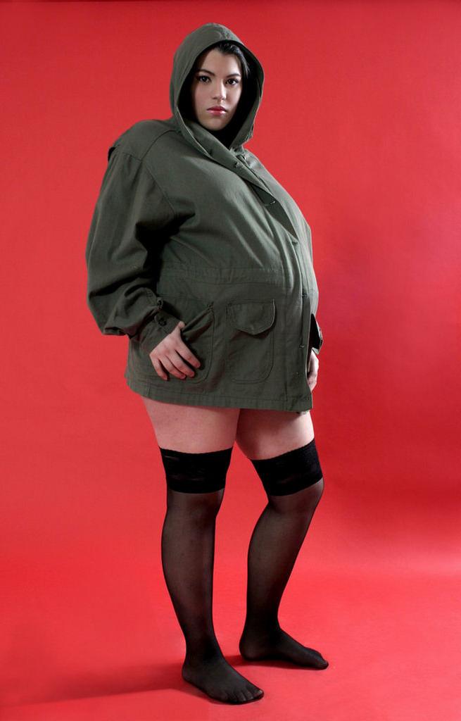 15P Sexy pregnant posing and stripping