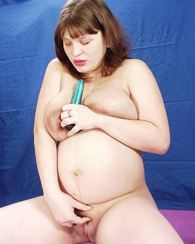 15P Sexy pregnant chick toying her pussy