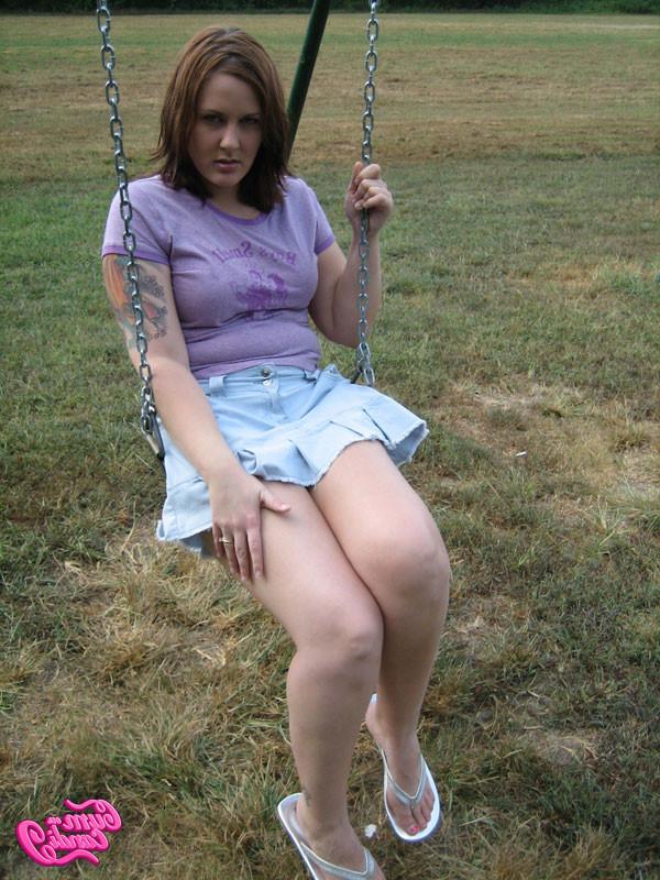 16P Candi Showing What's Up Her Skirt While Swinging On A Swing