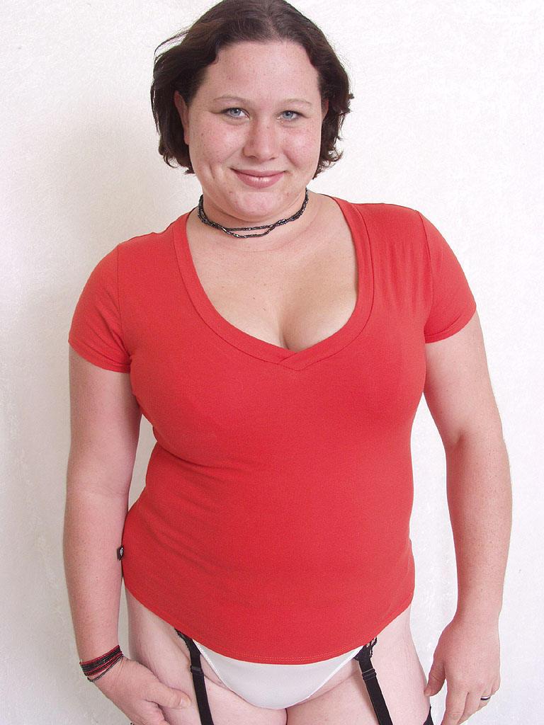 15P Plumper girl posing in black stocks
