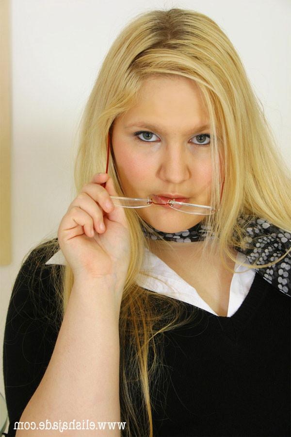 17P Plump blonde secretary in skirt with her hands down her panties